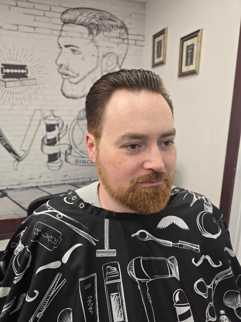 After — shaped ginger beard and styled cut